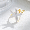 Wholesale Minimalist Fashion Stainless Steel Starfish Round Ring For Women With White Oil Dropping And Electroplating