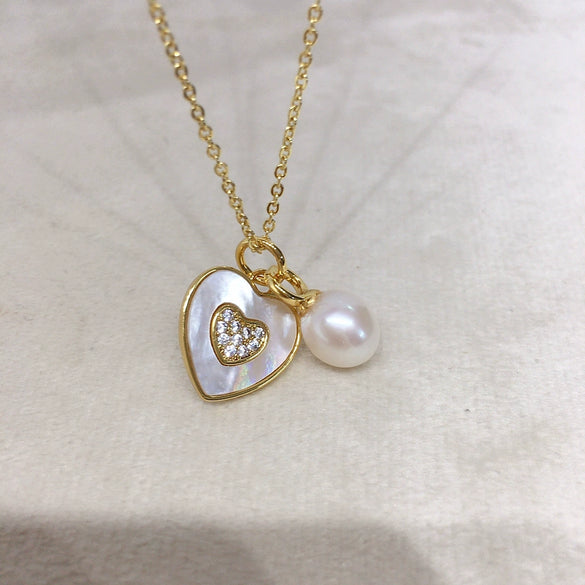Wholesale Minimalist Freshwater Pearl Pendant Necklace With Copper Accessories Microinlaid Zircon Love Sea Shell Shape