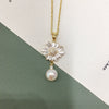 Wholesale Minimalist Freshwater Pearl Pendant Necklace With Copper Flat Round And Bun Round Pearls Sunflower Design