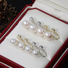 Wholesale Minimalist Unisex Steamed Bun Round Natural Freshwater Pearl S925 Silver Painless Ear Clip With Silicone Ear Buckle
