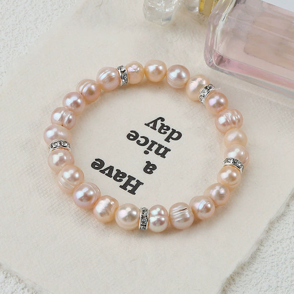 Wholesale Minimalist Women's Natural Freshwater Real Pearl Bracelet With Elastic Thread And Round Pattern