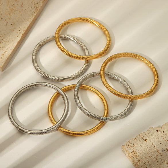 Wholesale Minimalistic Spiral Design Stainless Steel Bracelet Jewelry With Vacuum Real Gold Electroplating In Pvd Furnace
