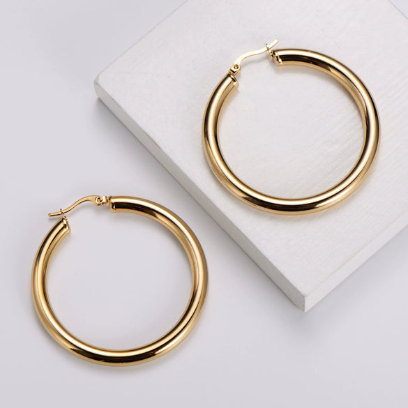 Wholesale Modern Style Exquisite Stainless Steel Polished 18K Gold Plated Thick Round Wire Hollow Large Hoop Earrings With Geometric Design