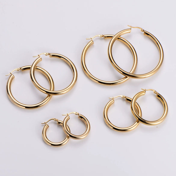 Wholesale Modern Style Exquisite Stainless Steel Polished 18K Gold Plated Thick Round Wire Hollow Large Hoop Earrings With Geometric Design