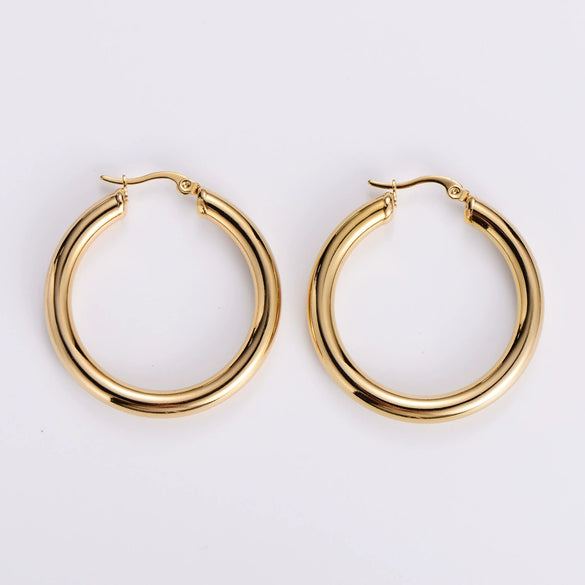 Wholesale Modern Style Exquisite Stainless Steel Polished 18K Gold Plated Thick Round Wire Hollow Large Hoop Earrings With Geometric Design