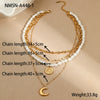 Wholesale Multi Layer Stacked Baroque Pearl Style Stainless Steel Clavicle Chain With Geometric Pattern And Electroplating For Women