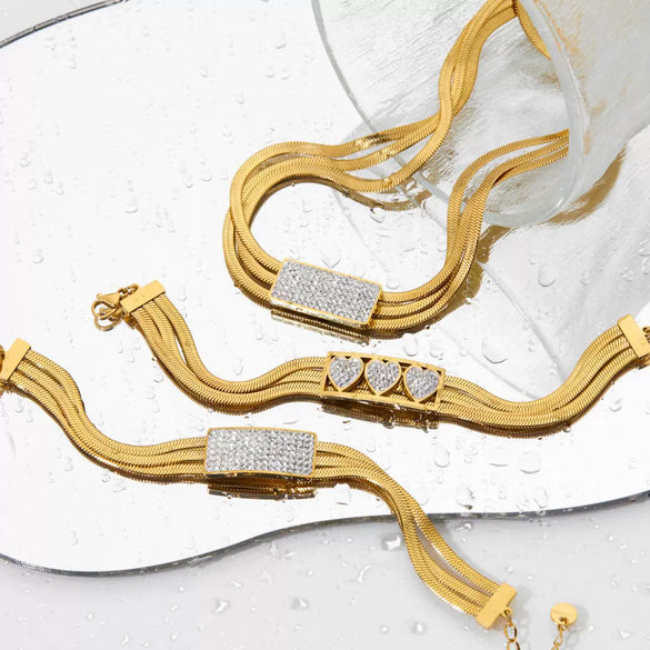 Wholesale Multi Layer Stainless Steel Love Themed Jewelry Suit With Vacuum Plated Clavicle Chain And Bracelet For Women