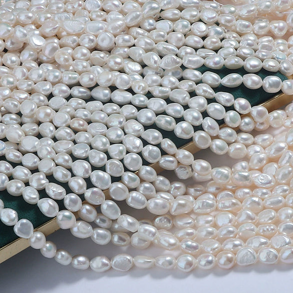 Wholesale Naked Freshwater Pearls Doublesided Light Baroque Shaped String