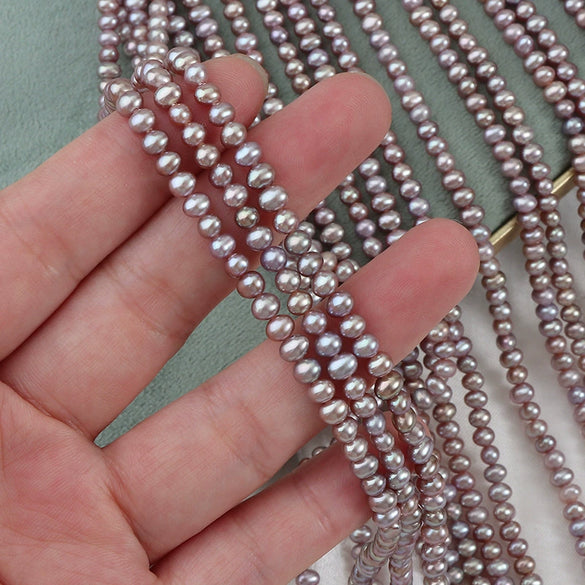 Wholesale Natural Freshwater Pearl Eggshaped String Jewelry Purple