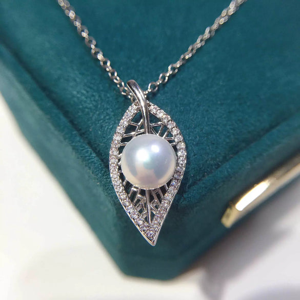 Wholesale Natural Freshwater Pearl Necklace With Copper Plated Gold Leaf Pendant Flat Round And Steamed Bread Round Pearl Boutique Craft