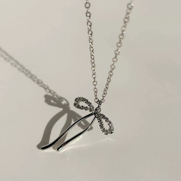 Wholesale Necklace Copper Snake Bone Chain Bow Bead Pendant Titanium Steel Vacuum Electroplated