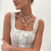 Wholesale Necklace Imitation Pearl Iron Chain Alloy Heart Shape Geometric Baroque Retro Metal Relief Electroplating Pendant Clavicle Necklace For Women