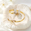 Wholesale Oildrip Floral Open Double Flower Alloy Bracelet With Electroplating Design