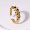 Wholesale Open Female Titanium Steel Ring With Irregular Random Pattern And Gold Plated Electroplating