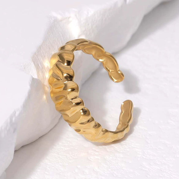 Wholesale Open Female Titanium Steel Ring With Irregular Random Pattern And Gold Plated Electroplating
