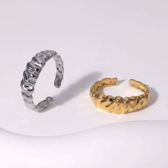 Wholesale Open Female Titanium Steel Ring With Irregular Random Pattern And Gold Plated Electroplating