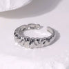 Wholesale Open Female Titanium Steel Ring With Irregular Random Pattern And Gold Plated Electroplating