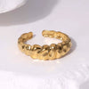 Wholesale Open Female Titanium Steel Ring With Irregular Random Pattern And Gold Plated Electroplating
