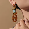 Wholesale Oval Resin And Stainless Steel Geometric Pig Nose Earrings For Women With Electroplating Design