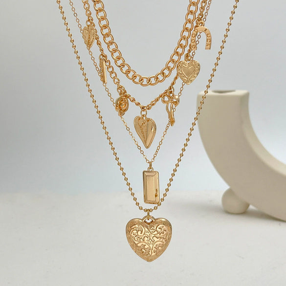 Wholesale Pendant Necklace Retro Geometric Iron Copperclad Iron Alloy Chain With Love Bow Heart Ushaped Pattern Electroplated