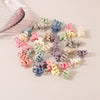 Wholesale Plastic And Resin Handmade Women's Hair Claw Clips With Cat's Eye And Flower Design