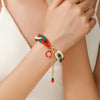 Wholesale Plastic Christmas Bracelet With Snowflake Bell And Festive Elements