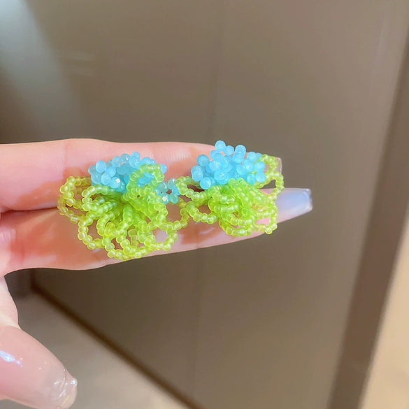 Wholesale Plastic Resin Handmade Flower Tassel Earrings With Silver Needle In Small Fresh Style