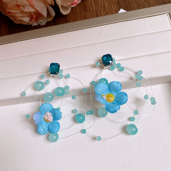 Wholesale Plastic Resin Handmade Flower Tassel Earrings With Silver Needle In Small Fresh Style