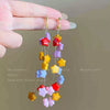 Wholesale Plastic Resin Handmade Flower Tassel Earrings With Silver Needle In Small Fresh Style