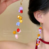 Wholesale Plastic Resin Handmade Flower Tassel Earrings With Silver Needle In Small Fresh Style