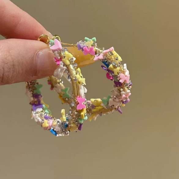 Wholesale Plastic Resin Handmade Flower Tassel Earrings With Silver Needle In Small Fresh Style