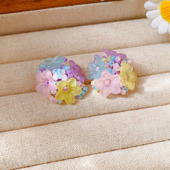 Wholesale Plastic Resin Handmade Flower Tassel Earrings With Silver Needle In Small Fresh Style