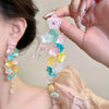 Wholesale Plastic Resin Handmade Flower Tassel Earrings With Silver Needle In Small Fresh Style