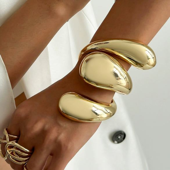 Wholesale Platinum Exaggerated Smooth Hug Water Drop Spring Bracelet For Women With Geometric Style And Electroplating Treatment