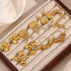 Wholesale Retro Creative Stainless Steel 18K Gold Plated Snail Tassel Flower Earrings For Women With Geometric Pattern And Electroplating Treatment