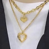 Wholesale Retro Fashion High End Simple Multi Layer Titanium Steel Chain With Hollow Heart Pendant And Electroplating Treatment