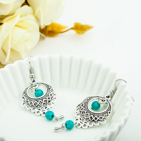 Wholesale Retro Hollow Turquoise Water Drop Earrings With Bohemian Tassels Alloy Electroplated Jewelry For Women