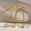 Wholesale Retro Style Stainless Steel Bow Love Earrings