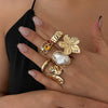 Wholesale Ring Imitation Pearl Geometric Flower Liquid Lava Open Baroque Ins Style Electroplated