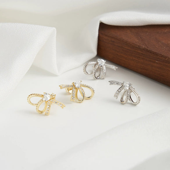 Wholesale S925 Silver Butterfly Temperament Earrings With Bow Tie Pattern And Electroplating Design