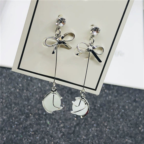 Wholesale S925 Silver Needle Long Opal Bow Ear Stud Earrings With Geometric Pattern And Electroplating