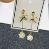Wholesale S925 Silver Needle Long Opal Bow Ear Stud Earrings With Geometric Pattern And Electroplating