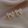 Wholesale S925 Silver Pearl Electroplated Alloy Flower Water Drop Cat's Eye Earrings For Women