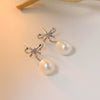 Wholesale S925 Sterling Silver And Freshwater Pearl Bow Handmade Earrings For Women