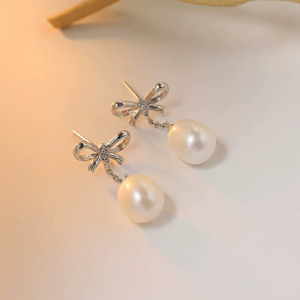 Wholesale S925 Sterling Silver And Freshwater Pearl Bow Handmade Earrings For Women