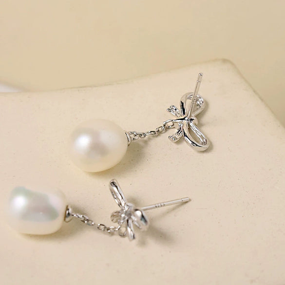 Wholesale S925 Sterling Silver And Freshwater Pearl Bow Handmade Earrings For Women