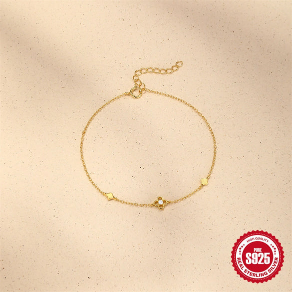 Wholesale S925 Sterling Silver Minimalist Glossy Four Leaf Clover Flower Bracelet With Real Gold Plating Electroplating Design For Women