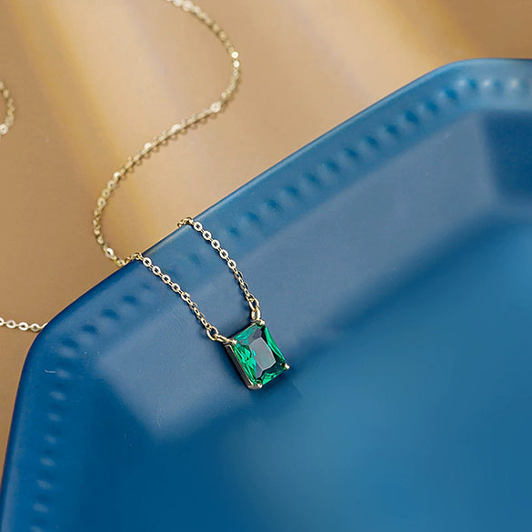 Wholesale S925 Sterling Silver Women's Clavicle Chain Necklace With Four Claw Inlaid Emerald And Small Green Zircon Geometric Pattern