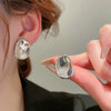 Wholesale Silver Metal Multi Layer Geometric Circle Cold Wind Electroplated Earrings For Women Light Luxury High End Style