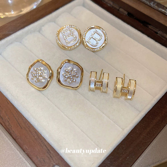 Wholesale Silver Needle Earrings With Real Gold Electroplated Metal Letter Pattern Light Luxury Style